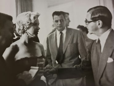 Marilyn Monroe and Irving Berlin at a party