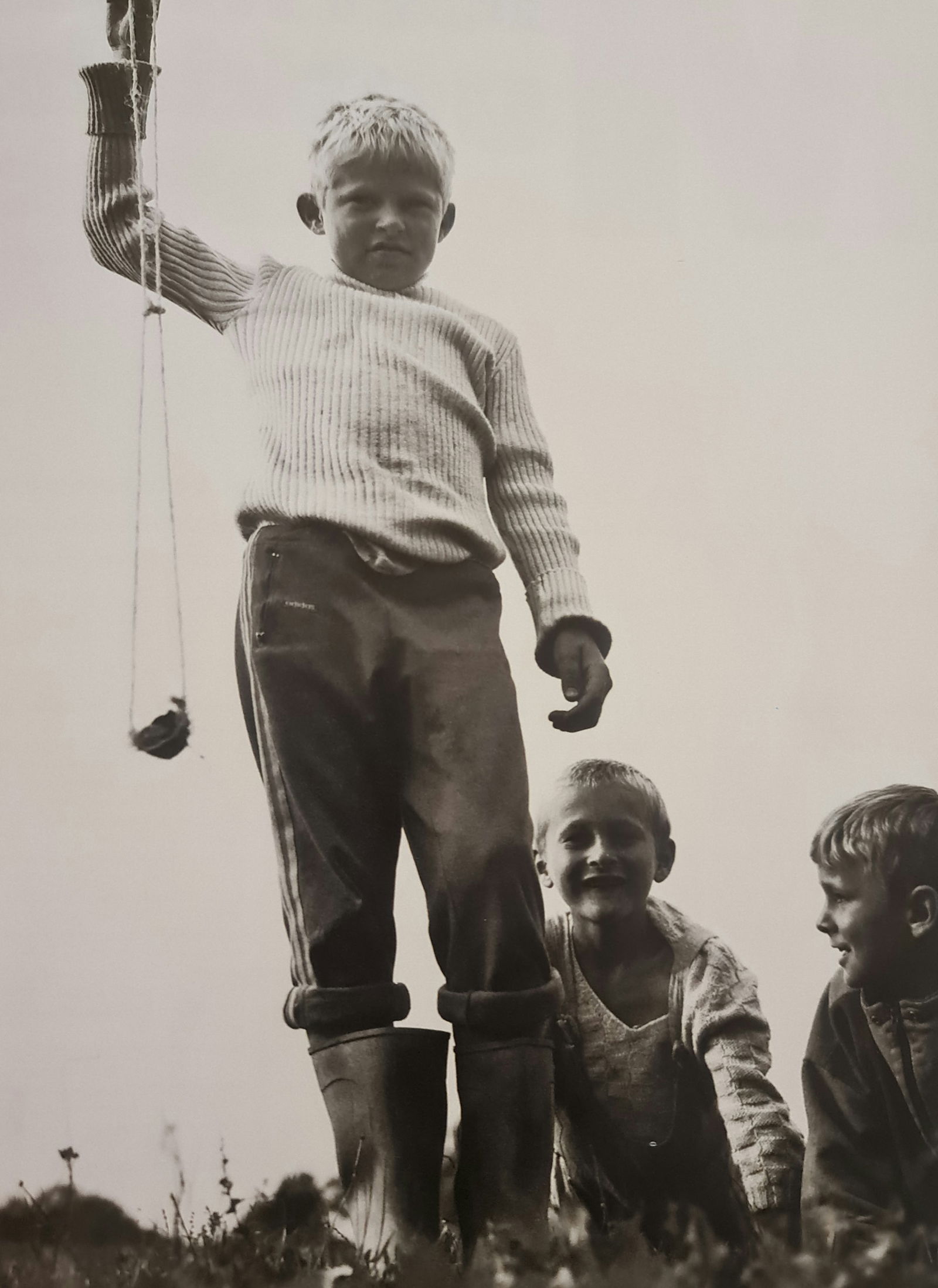 Michel Compte, Boy playing with a sling in Bosnia, 1996: Photographer: Michel Comte (born 19 February 1954) is a Swiss artist, filmmaker, fashion and portrait photographer. Subject/Title: Frida Kahlo Date Of Negative: 1996 Type Of Print: Sheet Fed Photograv