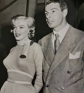 Marilyn Monroe, Baseball star Joe DiMaggio visiting Marilyn on the set of Monkey Business, 1952: Photographer: Unknown Subject/Title: Marilyn Monroe, Baseball star Joe DiMaggio visiting Marilyn on the set of Monkey Business Date Of Negative: 1952 Type Of Print: Sheet Fed Photogravure/Heliogravure