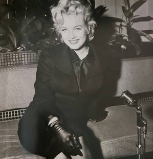 Marilyn Monroe, Beaming in black tailored suit, 1956: Photographer: Unknown Subject/Title: Marilyn Monroe, Beaming in black tailored suit Date Of Negative: 1956 Type Of Print: Sheet Fed Photogravure/Heliogravure Date Of Print: 2008 Publisher: Parragon Pa