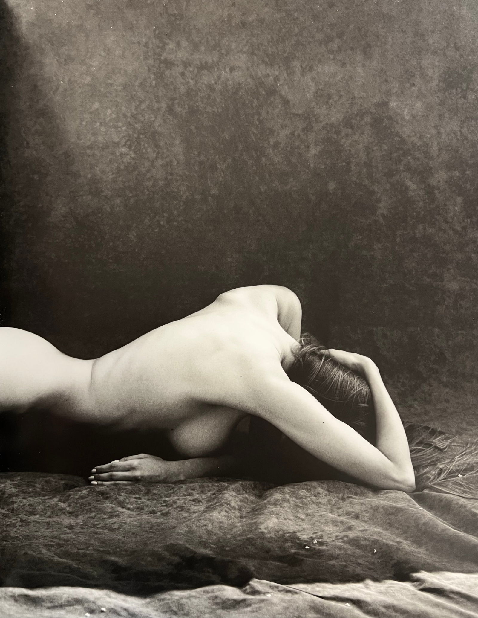 Marc Lagrange, Contortion, 2000's: Photographer: Marc Lagrange was a Belgian photographer known for his nude portraits of female figures. Lagrange created dream-like and fantastical narrative pictures populated by beautiful nudes that