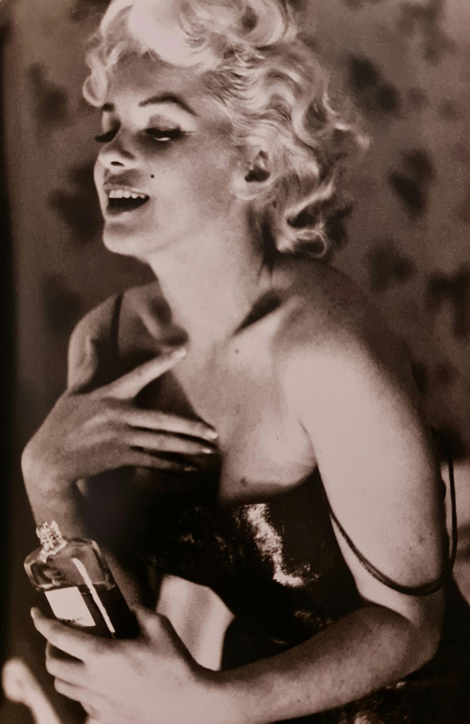 Ed Feingersh, Marilyn Monroe with Chanel #5, 1955: Photographer: Ed Feingersh Subject/Title: Marilyn Monroe with Chanel #5 Date Of Negative: 1939 Type Of Print: Sheet Fed Photogravure/Heliogravure Date Of Print: 2000 Publisher: teNeues Paper: Medium w