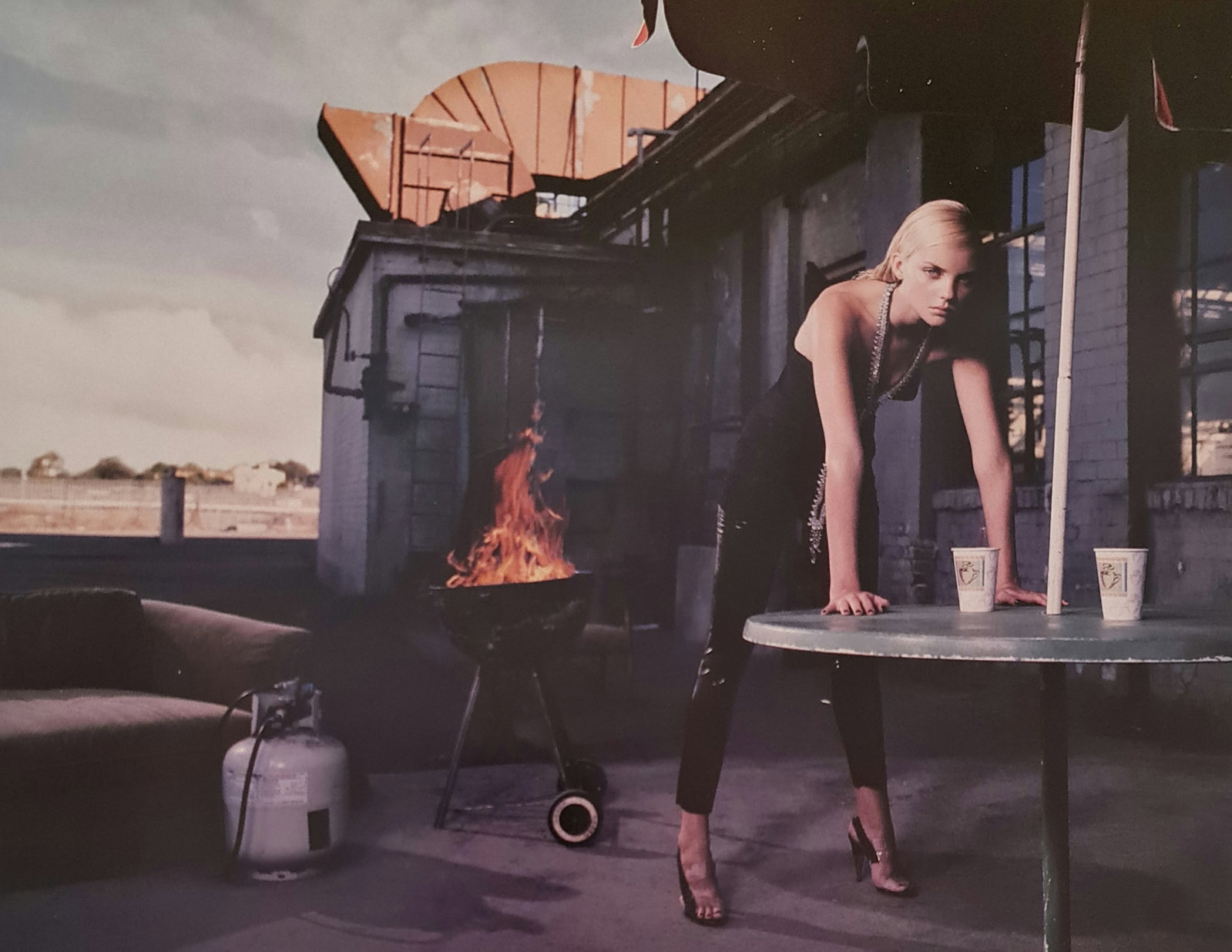 Jacques Olivar, Heather with Fire, Los Angeles, 2006: Photographer: Jacques Olivar, born in Casablanca in 1941, was an advertising photographer and movie director before embracing fashion photography. Visual seduction and cinematic sensibility are keys t