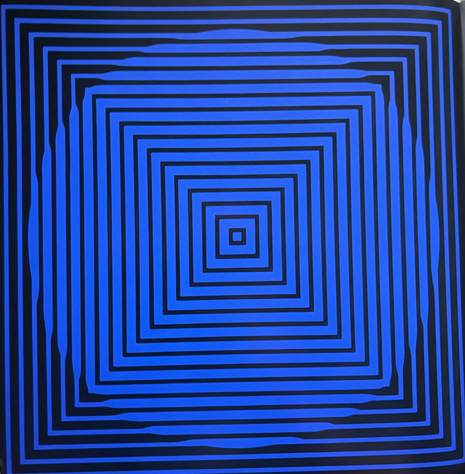 Victor Vaserely, Blue and black circles: Description: Title: Blue and black circles Type: Monograph on paper, framed Not Signed or numbered, as published Published by Editions Du Griffon Neuchatel in 1971, and printed in Switzerland. Size 10