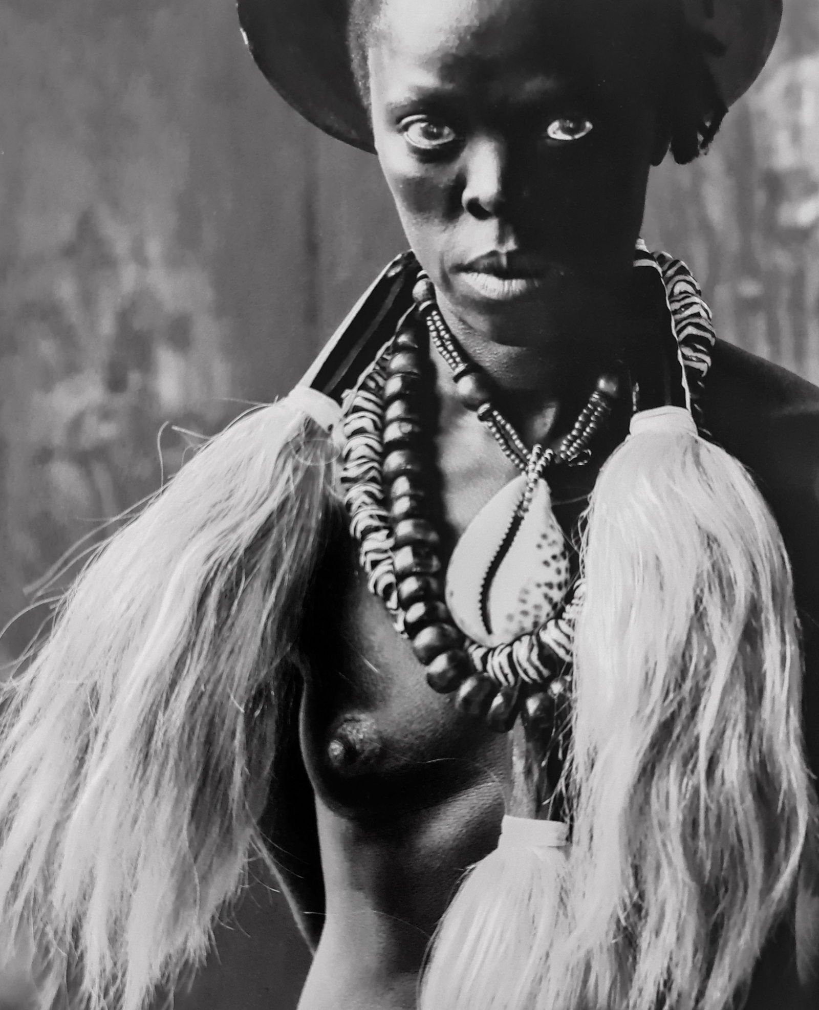 Zanele Muholi, Somnyama Ngonyama - 2018: Photographer: Zanele Muholi was born in 1972. She is a South African photographer and filmmaker. Title: Somnyama Ngonyama Type Of Print: Authentic Vintage Sheet Fed Photogravure/Heliogravure Date Of P