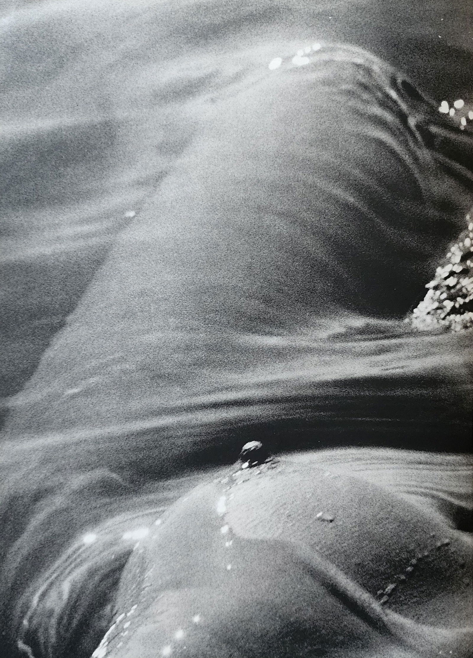 Lucien Clergue, On the beach, 1973: Photographer: Lucien Clergue (France, 1934 - 2014) - renowned French photographer with a diverse body of work, he is perhaps best known for his dynamic female nude studies in and around water which of