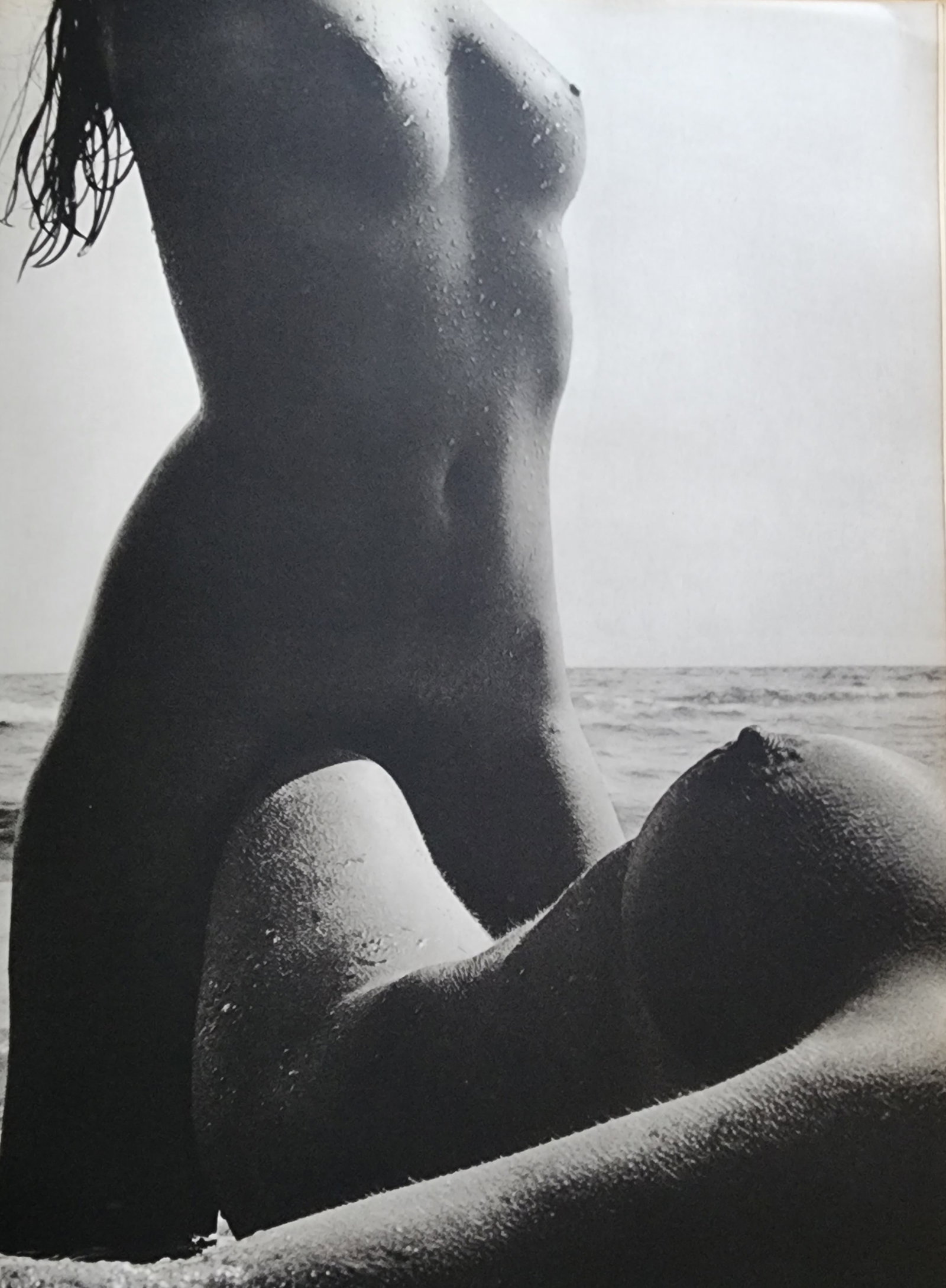 Lucien Clergue, On the beach, 1973: Photographer: Lucien Clergue (France, 1934 - 2014) - renowned French photographer with a diverse body of work, he is perhaps best known for his dynamic female nude studies in and around water which of