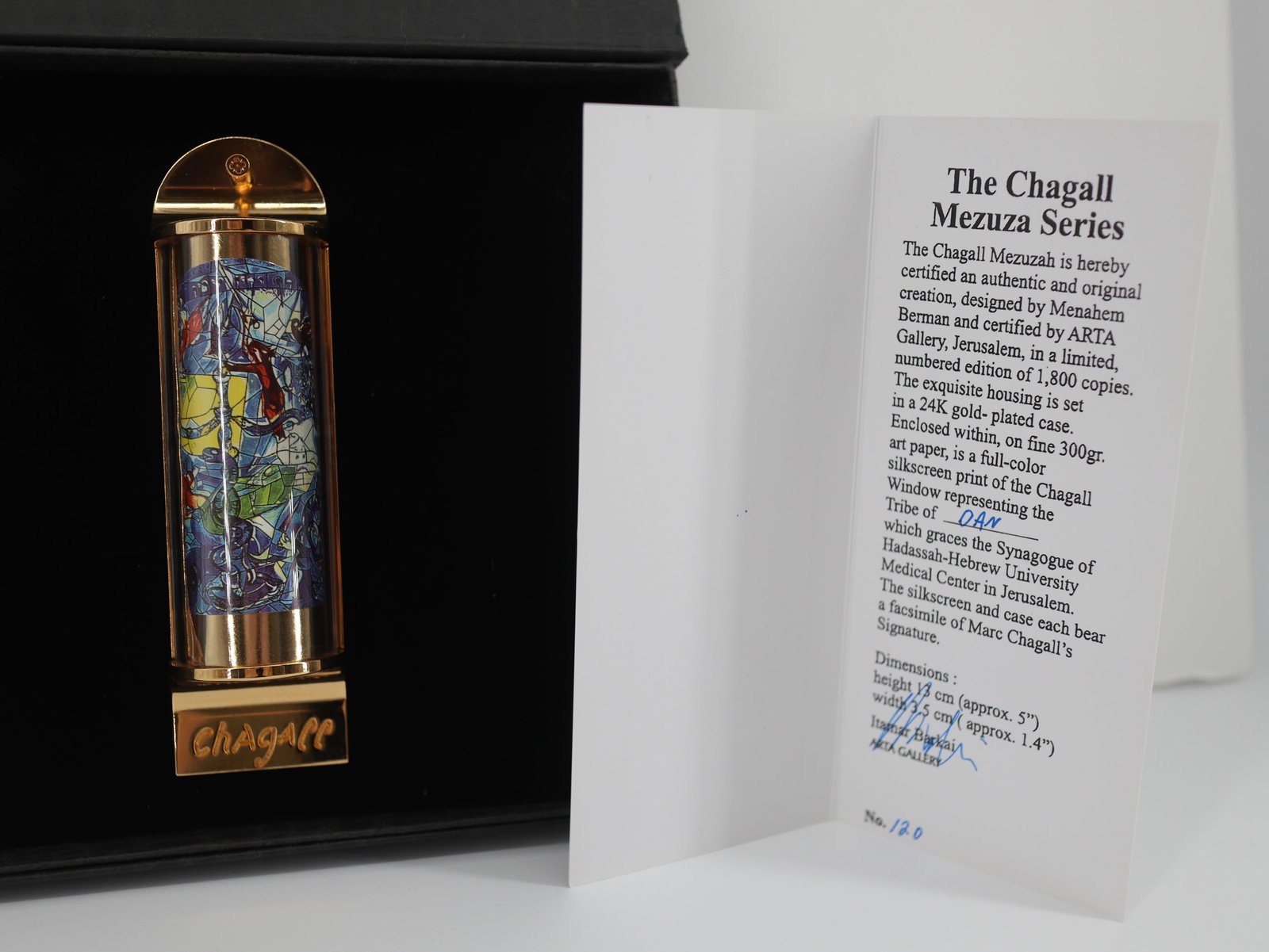 Marc Chagall, 'Dan', 24K Gold Plated Limited Edition Mezuzah: Artist: Marc Chagall Medium: Mezuzah - Exquisite glass housing is set in a 24K gold plated bronze with full color silkscreen TITLE: DAN (THE TWELVE TRIBES SERIES) Size: 5" x 1.5" Weight: 7 oz. Limited