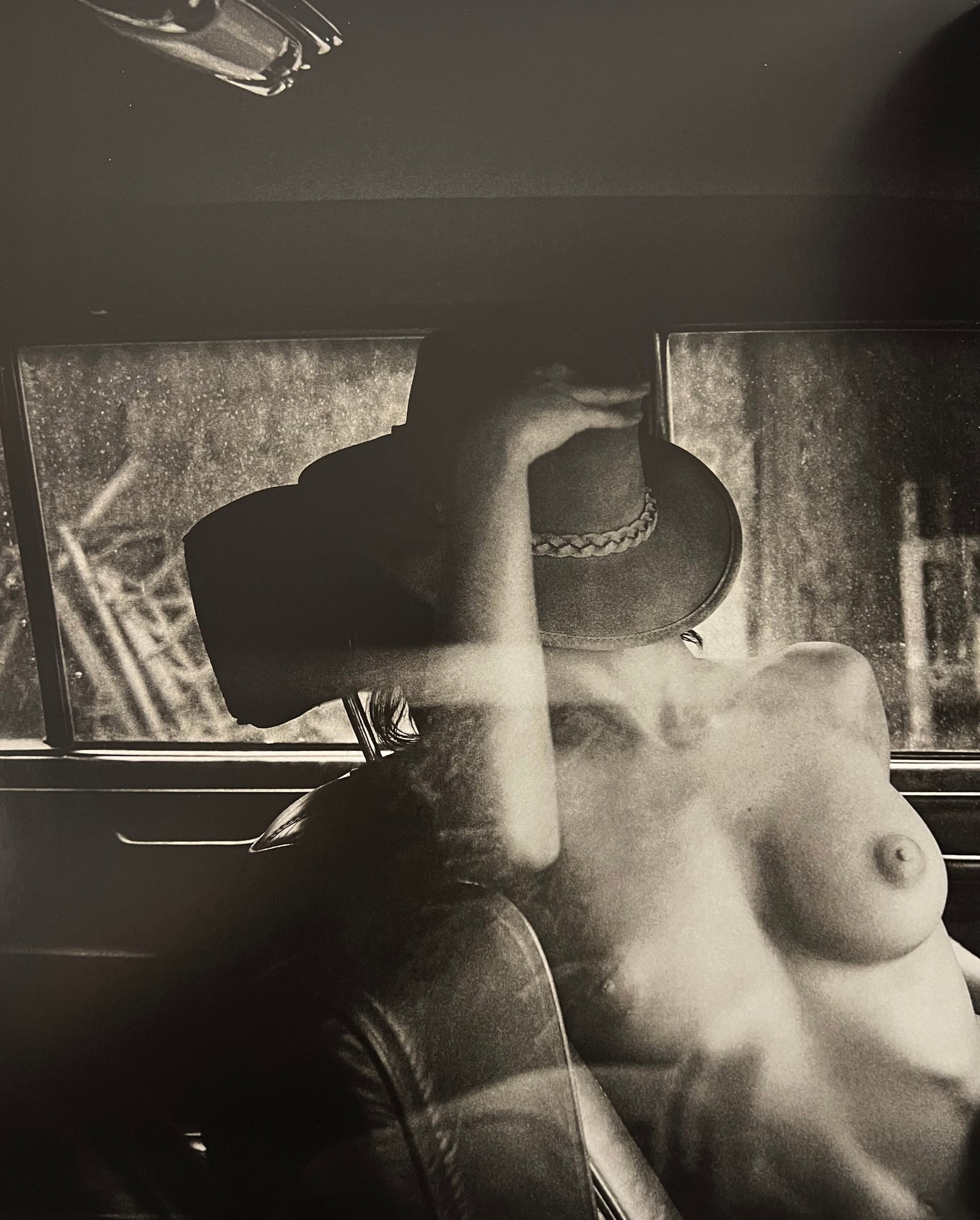 Marc Lagrange, You Can Leave Your Hat On, 2012: Photographer: Marc Lagrange was a Belgian photographer known for his nude portraits of female figures. Lagrange created dream-like and fantastical narrative pictures populated by beautiful nudes that 