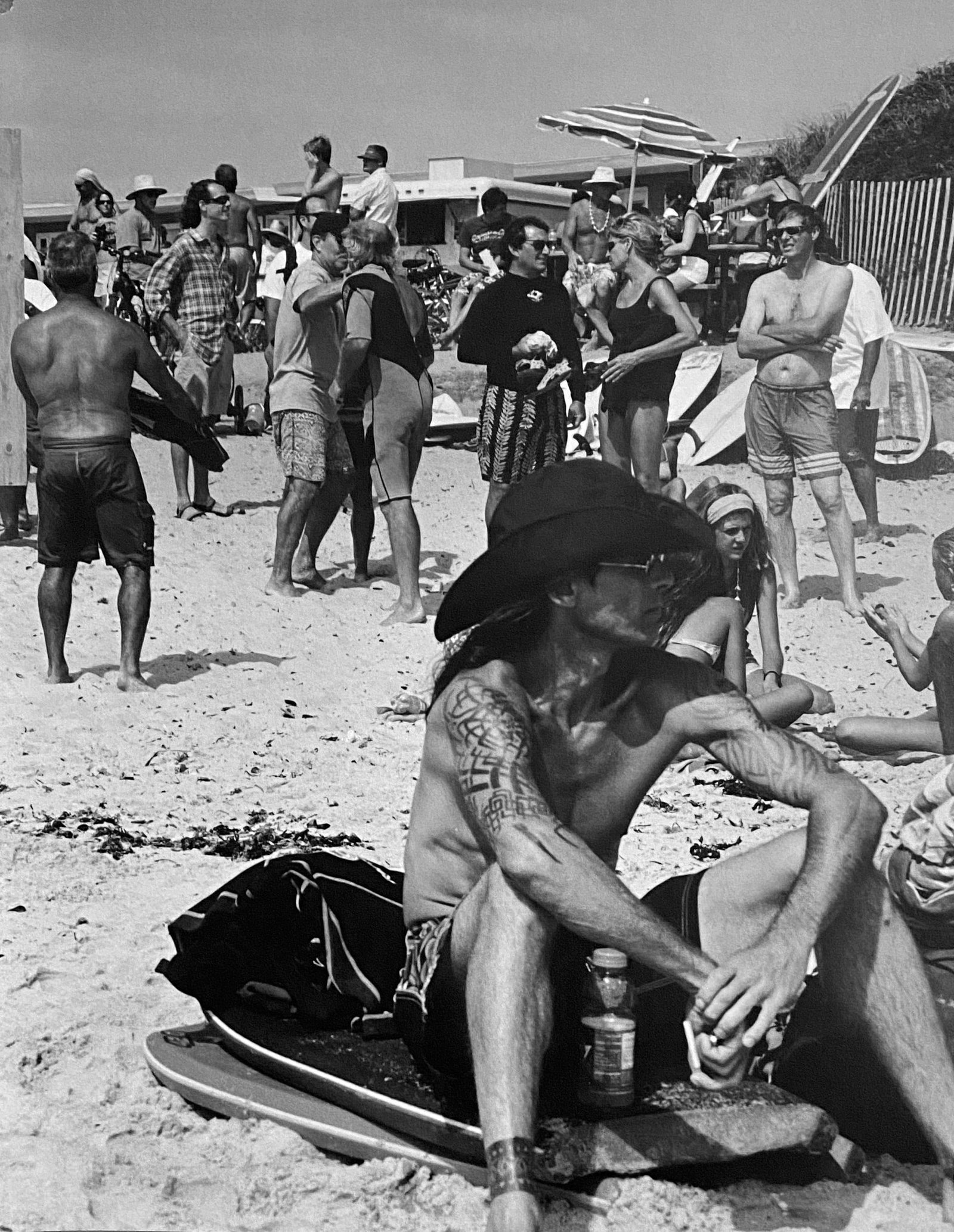 Michael Dweck, Saturday Afternoon Crowd, Ditch Plains: Photographer: Michael Dweck is an American visual artist and filmmaker. Best known for his narrative photography, Dweck's work "explores ongoing struggles between identity and adaptation in endangered