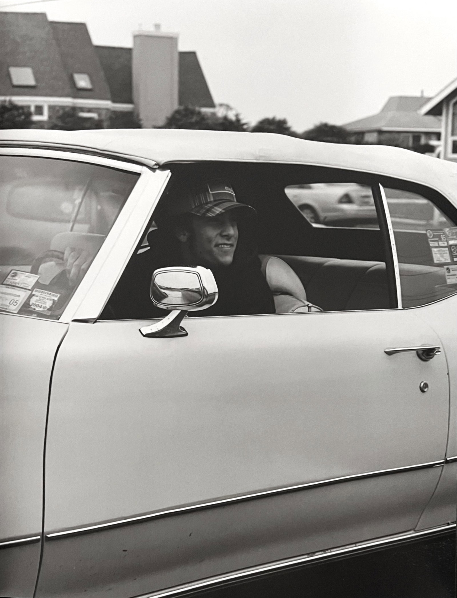 Michael Dweck, Spidey In His Uncle's Car, Ditch Plains: Photographer: Michael Dweck is an American visual artist and filmmaker. Best known for his narrative photography, Dweck's work "explores ongoing struggles between identity and adaptation in endangered
