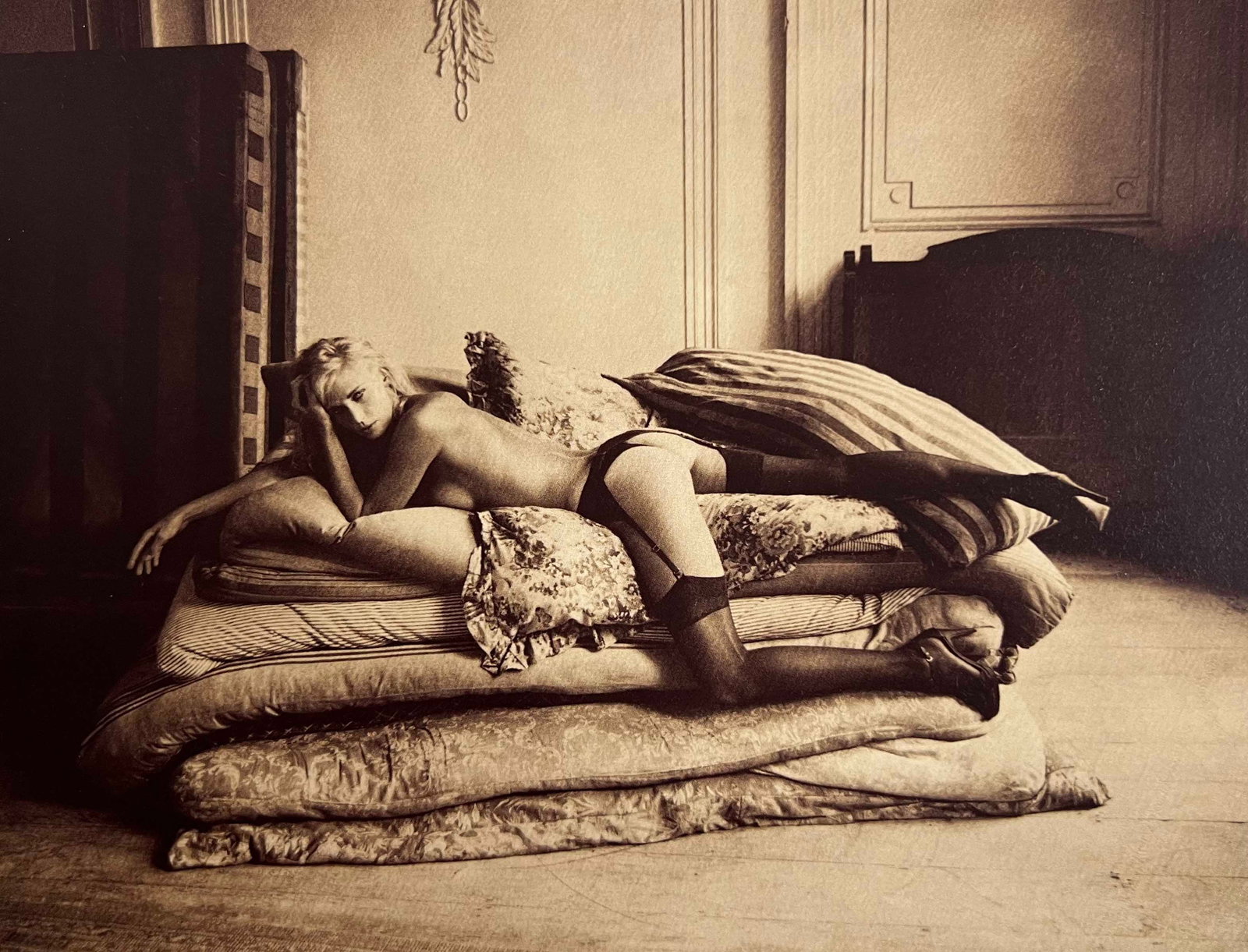 Marc Lagrange, Princess And The Pea I, 2010: Photographer: Marc Lagrange was a Belgian photographer known for his nude portraits of female figures. Lagrange created dream-like and fantastical narrative pictures populated by beautiful nudes that 