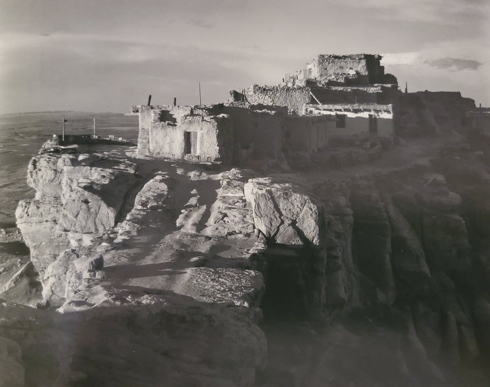 Ansel Adams, Sunrise, Old Walpi Pueblo, Arizona, C. 1942: Photographer: Ansel Adams (American, 1902 - 1984) - Internationally renowned American photographer. One of the most influential artists in photographic history. Title: "Sunrise, Old Walpi Pueblo, Ariz