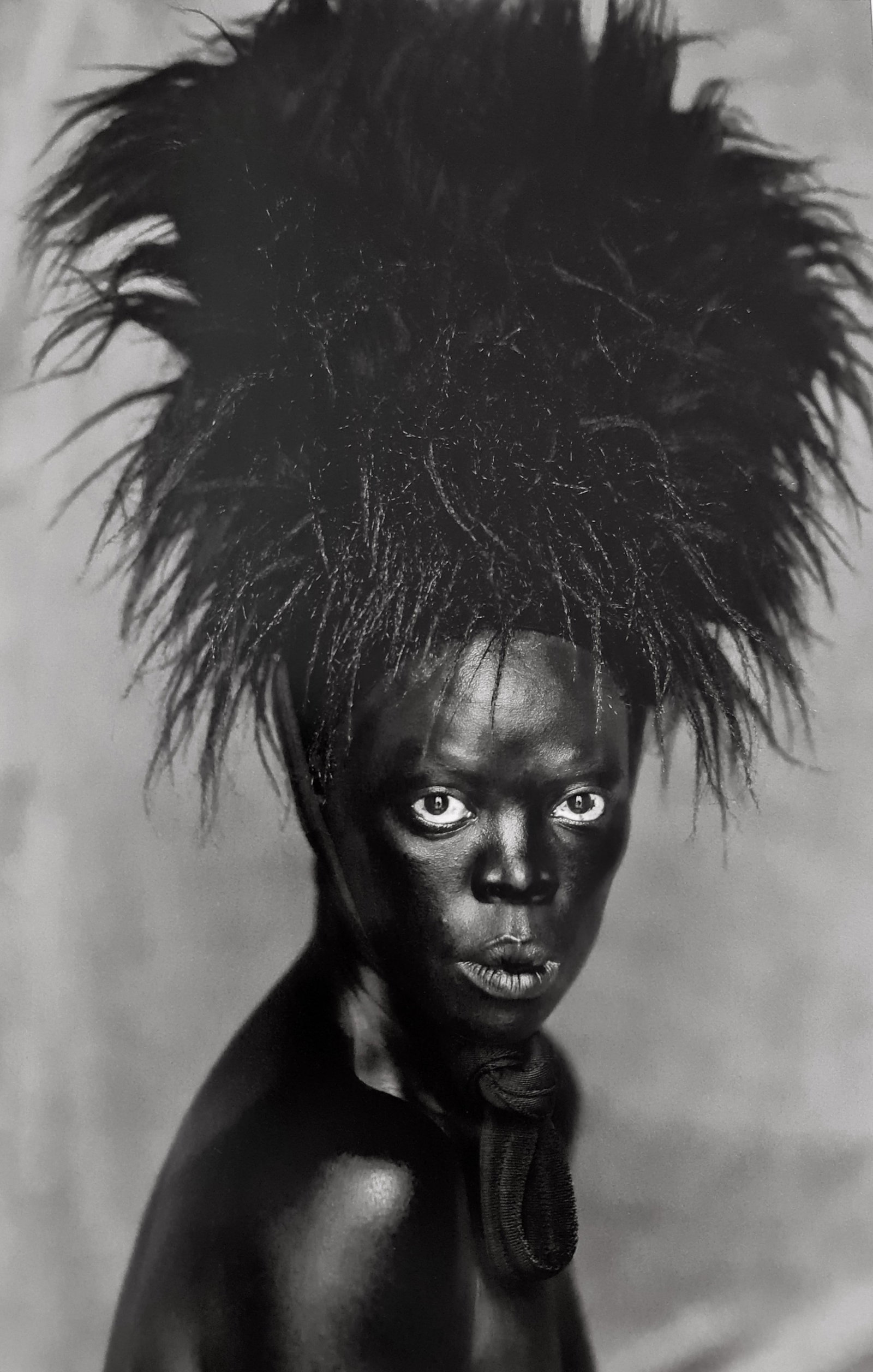 Zanele Muholi, Somnayama I, Paris, 2014: Photographer: Zanele Muholi was born in 1972. She is a South African photographer and filmmaker. Title: Somnayama I, Paris, 2014, 8.5 x 13 Date Of Negative: 2014 Type Of Print: Authentic Vintage Sheet