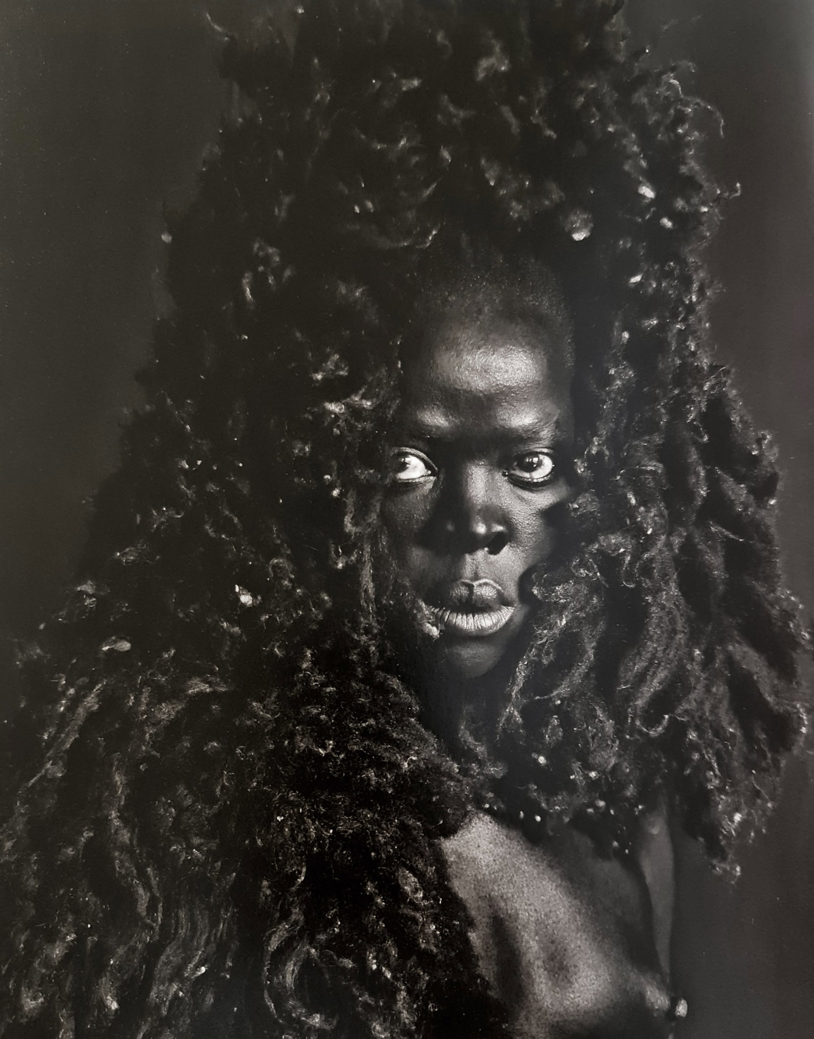Zanele Muholi, Somnyama IV, Oslo, 2015: Photographer: Zanele Muholi was born in 1972. She is a South African photographer and filmmaker. Title: Somnyama IV, Oslo, 2015, 9.5 x 11.5 Date Of Negative: 2015 Type Of Print: Authentic Vintage Shee