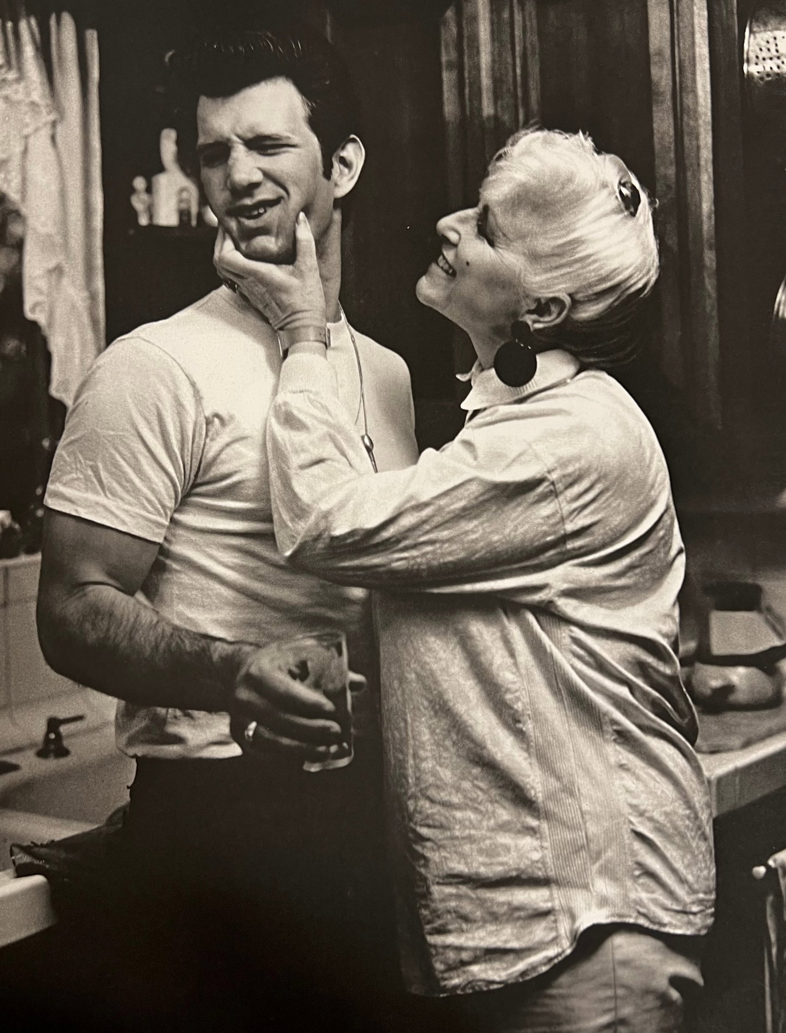 Bruce Weber, Lady squeezing man's cheeks, 1988: Photographer: Bruce Weber (American, b. 1946) - internationally renowned American fashion photographer best known for his racy, erotically charged imagery. Weber has shot the ad campaigns of Calvin Kl