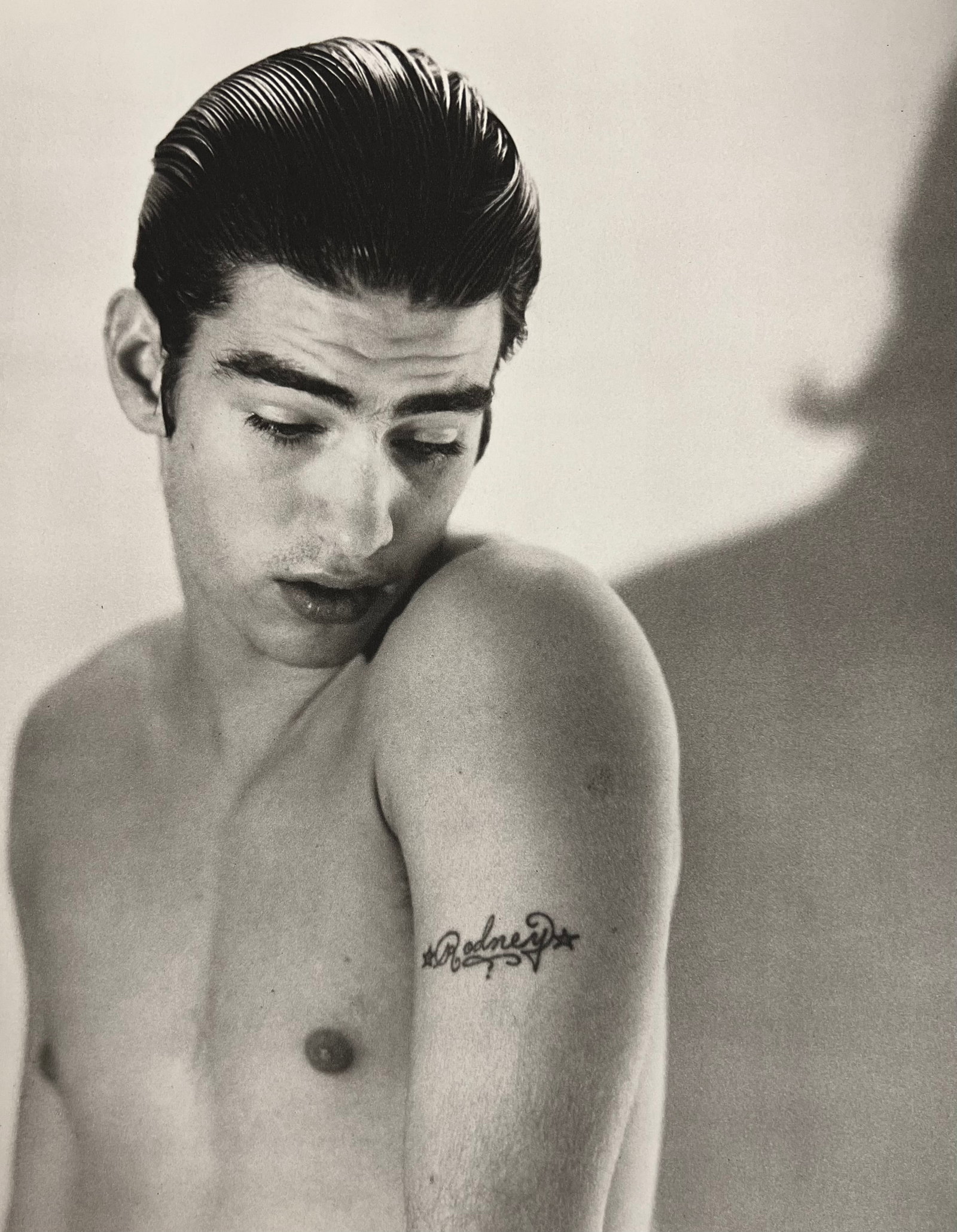 Bruce Weber, Man with Rodney tattoo, 1988: Photographer: Bruce Weber (American, b. 1946) - internationally renowned American fashion photographer best known for his racy, erotically charged imagery. Weber has shot the ad campaigns of Calvin Kl