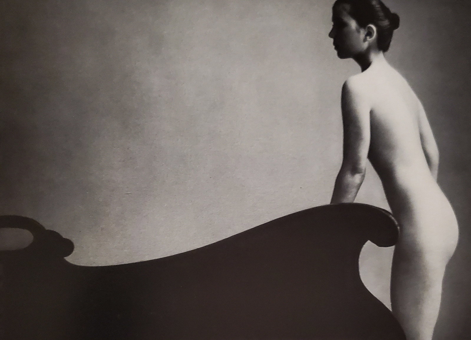John Swannell, Lady by the Couch, 1980's: Photographer: John Swannell was born in 1946. After leaving school at 16, he worked first as an assistant at Vogue Studios and then assisted David Bailey for four years before setting up his own studi