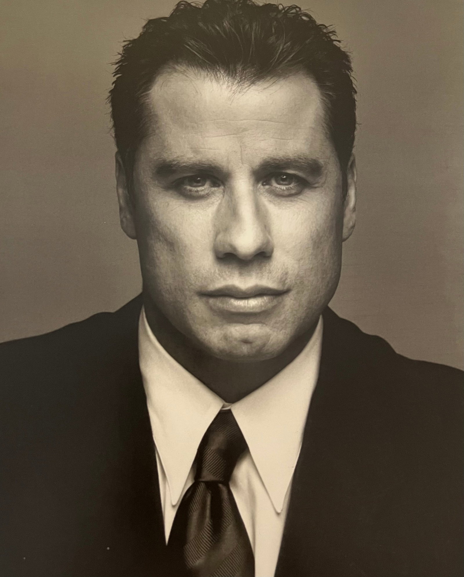Patrick Demarchelier, John Travolta I, Los Angeles, 1998: Photographer: PATRICK DEMARCHELIER: internationally renowned fashion and portrait photographer known for his ability to represent the true personalities of his subjects. He discovered his passion at 1