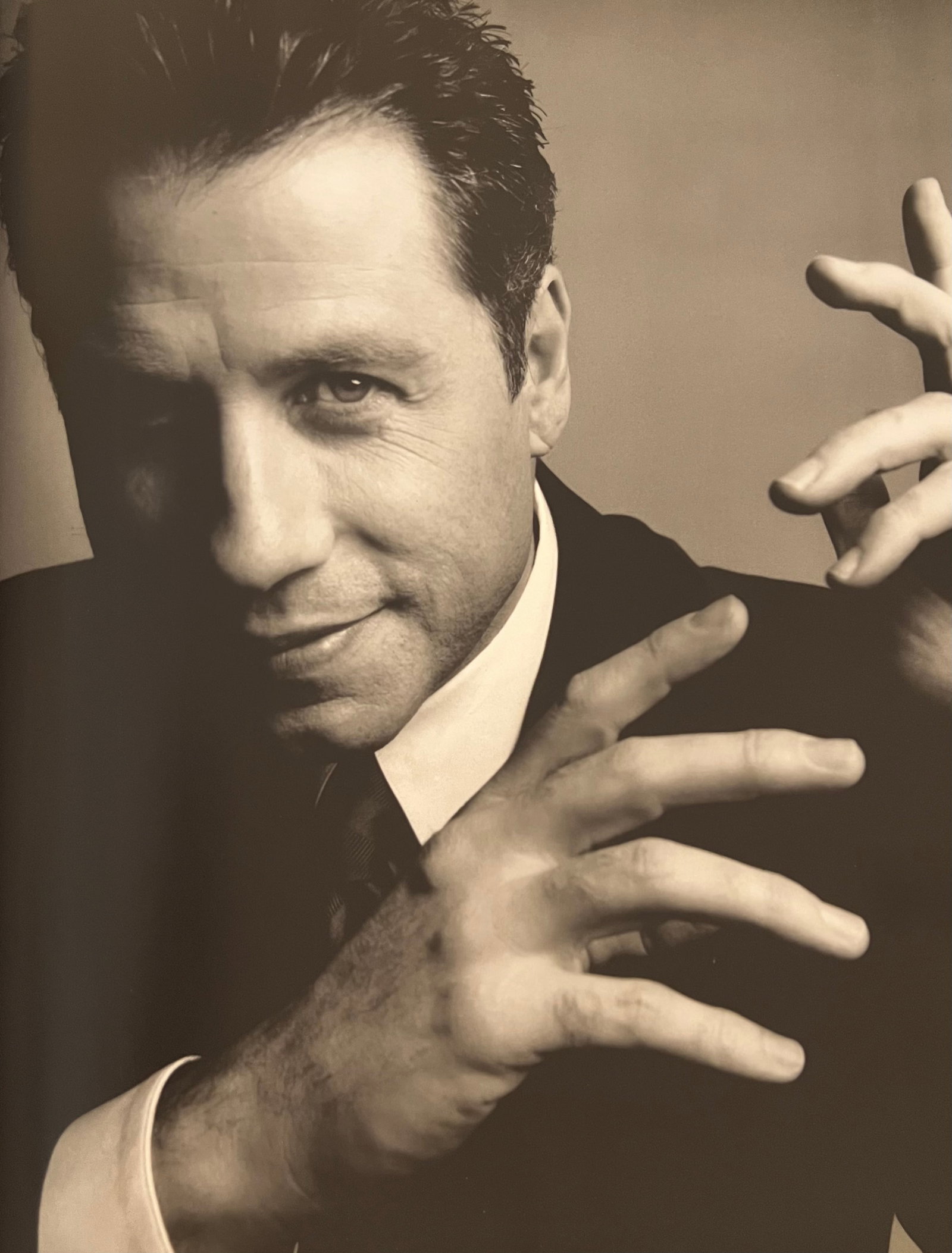 Patrick Demarchelier, John Travolta II, Los Angeles, 1998: Photographer: PATRICK DEMARCHELIER: internationally renowned fashion and portrait photographer known for his ability to represent the true personalities of his subjects. He discovered his passion at 1