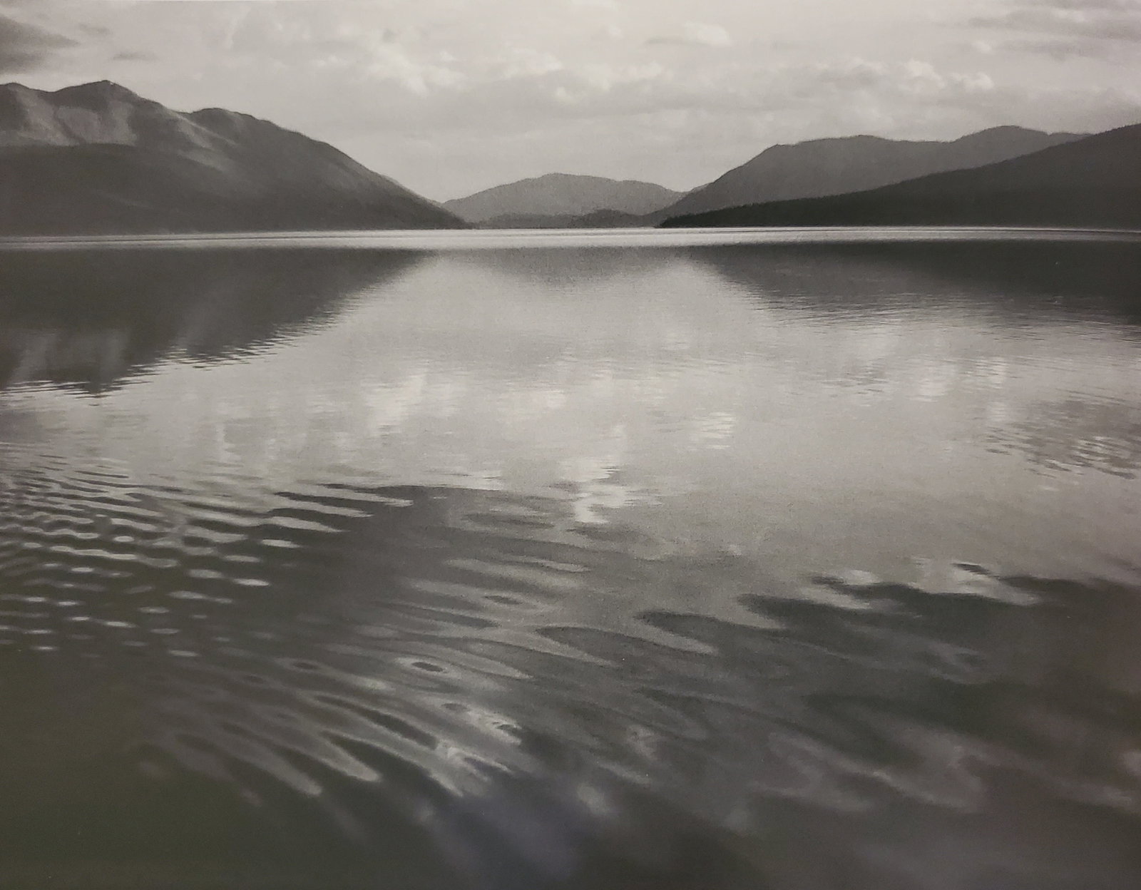 Ansel Adams, Lake Mcdonald, Evening, Glacier National Park, Montana, 1942: Photographer: Ansel Adams (American, 1902 - 1984) - Internationally renowned American photographer. One of the most influential artists in photographic history. Title: "Lake Mcdonald, Evening, Glacier