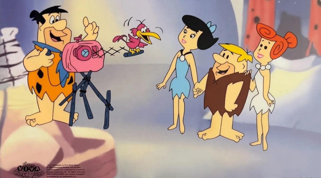 Hanna-Barbera, Flintstone's - Fred's Photo Op, Limited Edition Animation Cel: Limited edition Sericel of The Flintstones titled "Fred's Photo Op". This fantastic animation features Fred, Wilma, Barney and Betty as they appeared in the animated cartoon feature "Viva Rock Vegas".