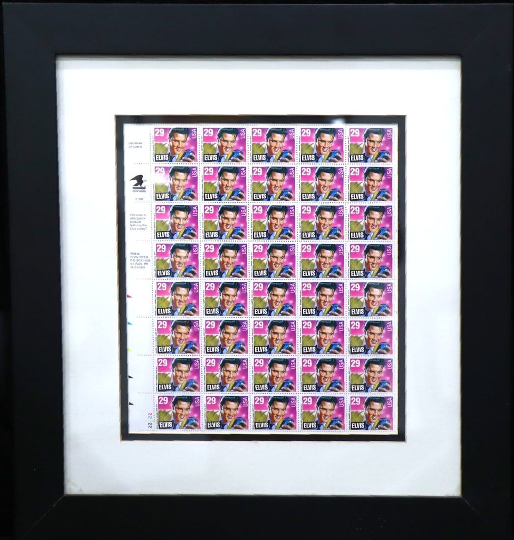 Framed Full Sheet of 29? Elvis Presley U.S. Postage Stamps: Framed full sheet of United States 29? Elvis Presley commemorative postage stamps. The sheet displays multiple identical stamps honoring the iconic American singer and cultural figure. Professionally 