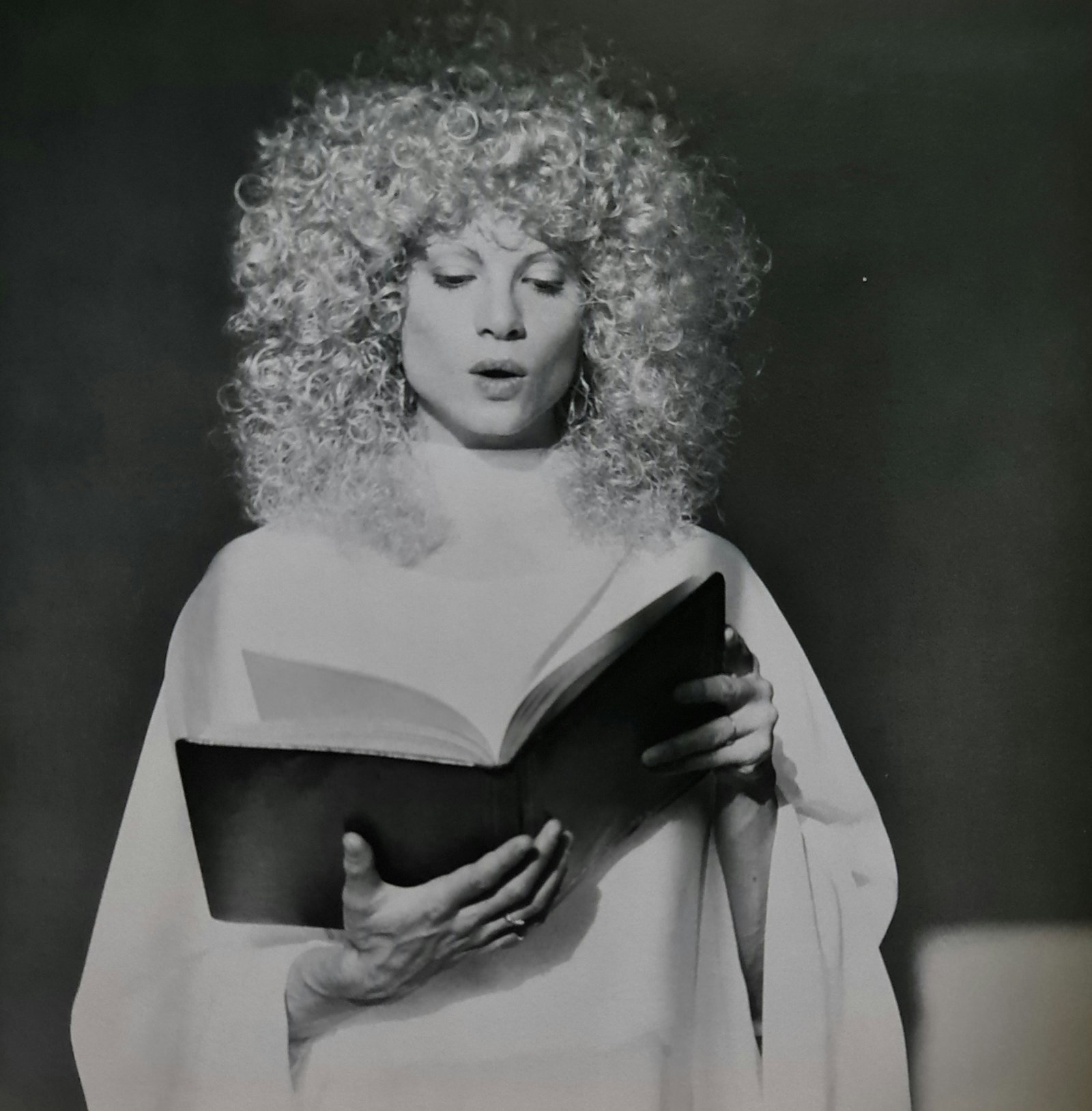Robert Mapplethorpe, Lisa Lyon reading: Photographer: Robert Michael Mapplethorpe (1946-1989) was an American photographer, best known for his black-and-white photographs. His work featured an array of subjects, including celebrity portrait