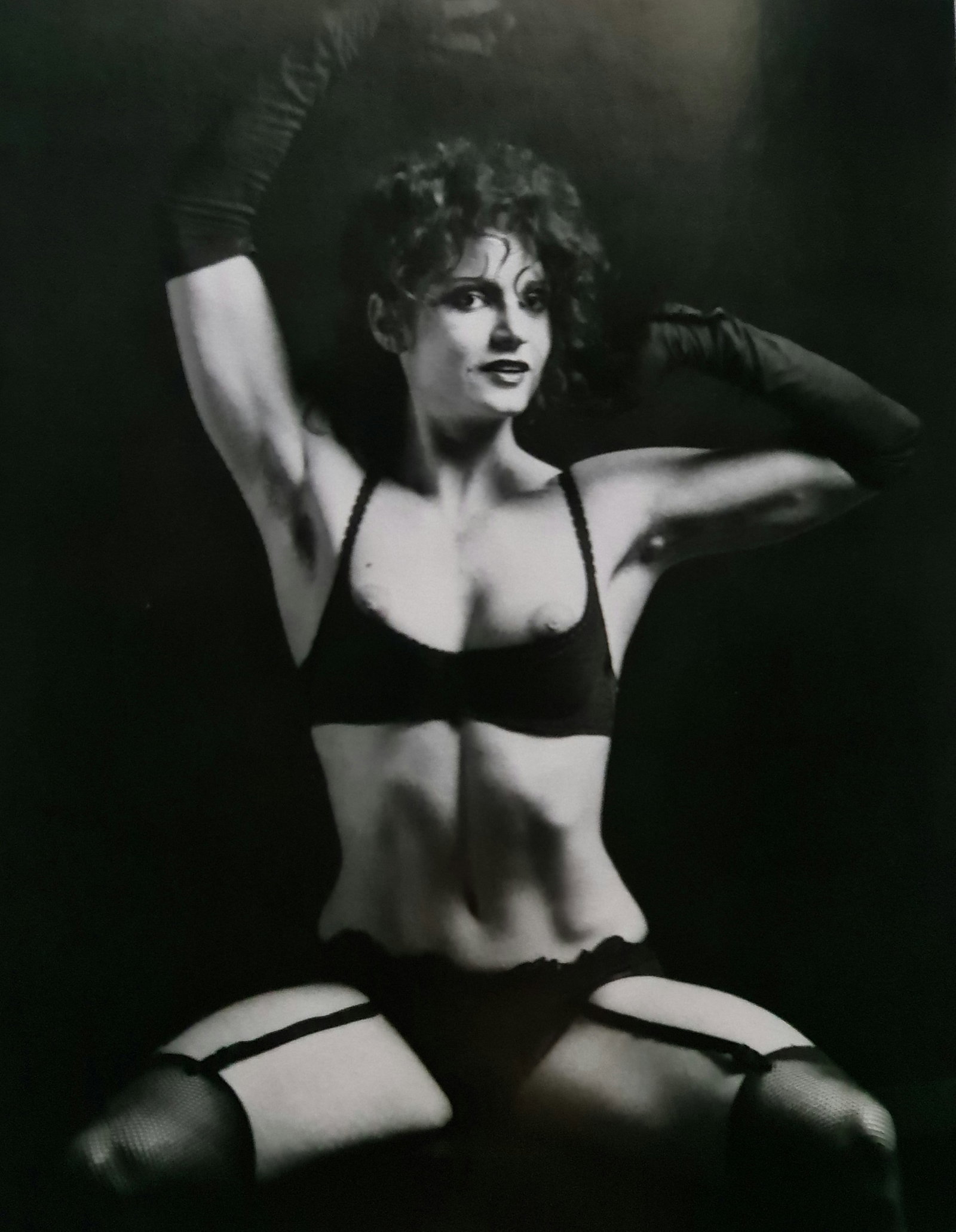 Robert Mapplethorpe, Lisa Lyon seated: Photographer: Robert Michael Mapplethorpe (1946-1989) was an American photographer, best known for his black-and-white photographs. His work featured an array of subjects, including celebrity portrait