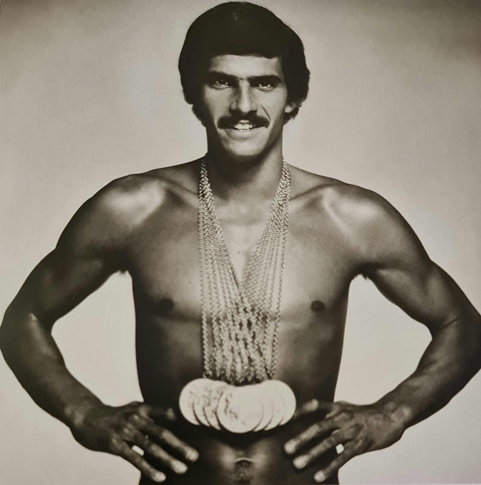 Terry O'Neill, Mark Spitz In London After Winning 7 Olympic Gold Medals, 1972: Photographer: Terry ONeill was a British photographer, known for documenting the fashions, styles, and celebrities of the 1960s. Title: Mark Spitz in London after winning 7 Olympic gold medals Date Of