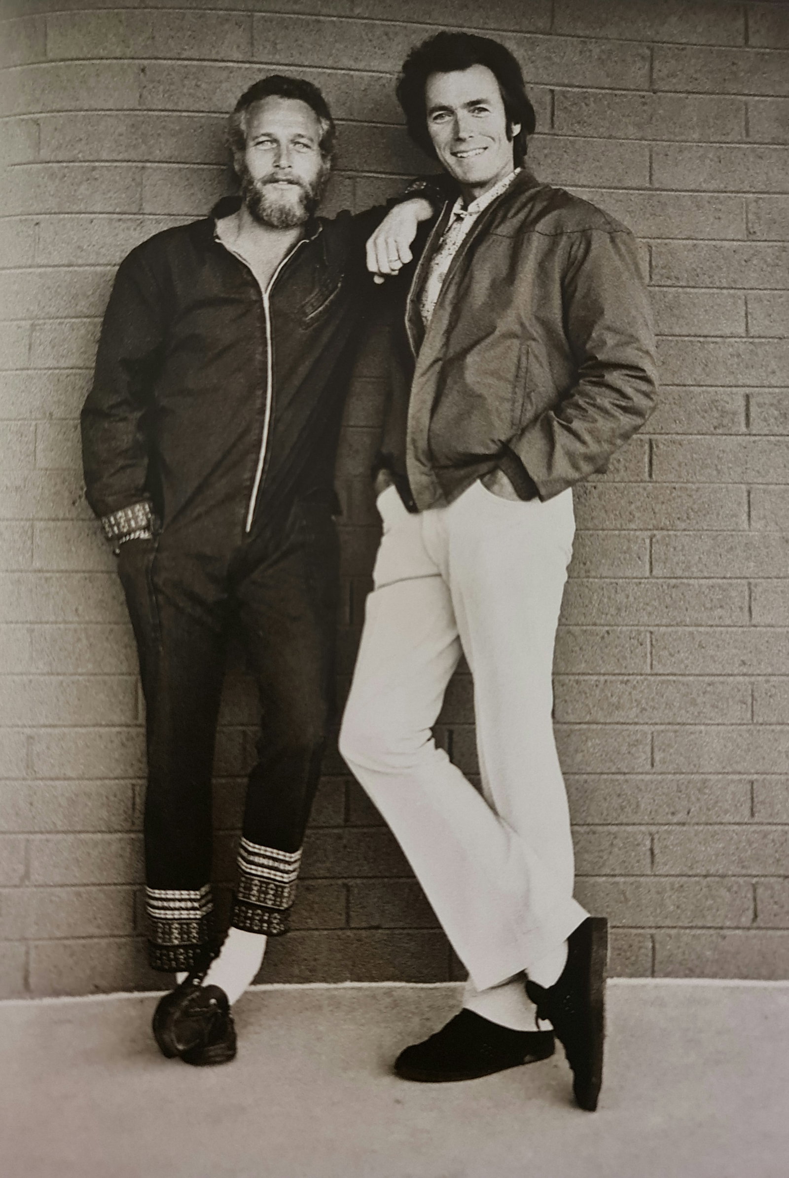 Terry O'Neill, Newman And Eastwood In A Chance Meeting At A Motel In Tucson, Arizona, 1972: Photographer: Terry ONeill was a British photographer, known for documenting the fashions, styles, and celebrities of the 1960s. Title: Newman and Eastwood in a chance meeting at a motel in Tucson, Ar