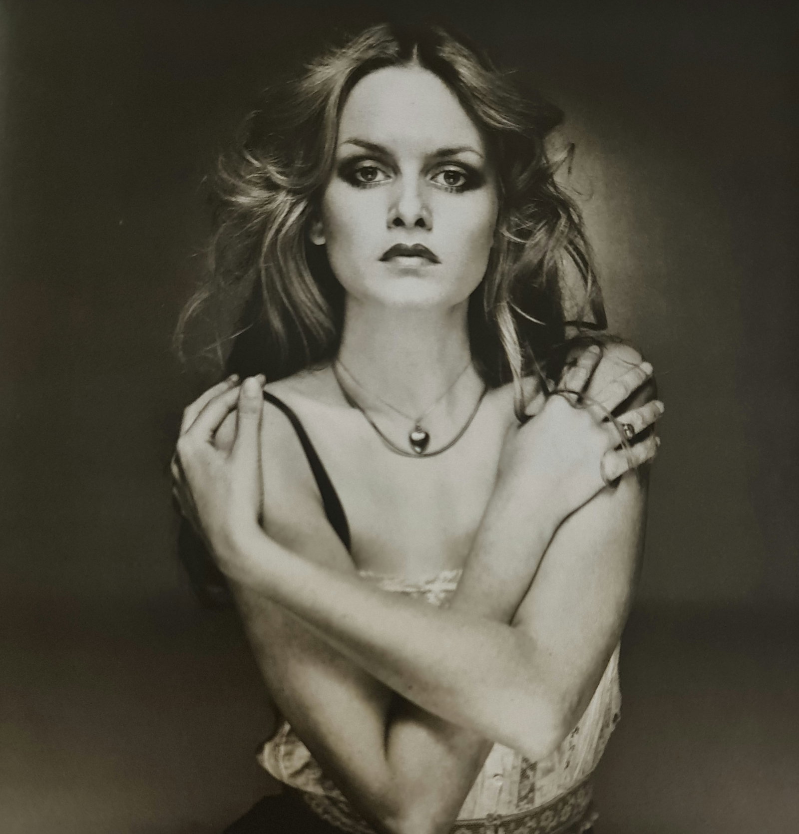 Terry O'Neill, Twiggy, London, 1975: Photographer: Terry ONeill was a British photographer, known for documenting the fashions, styles, and celebrities of the 1960s. Title: Twiggy, London Date Of Negative: 1975 Type Of Print: Authentic S