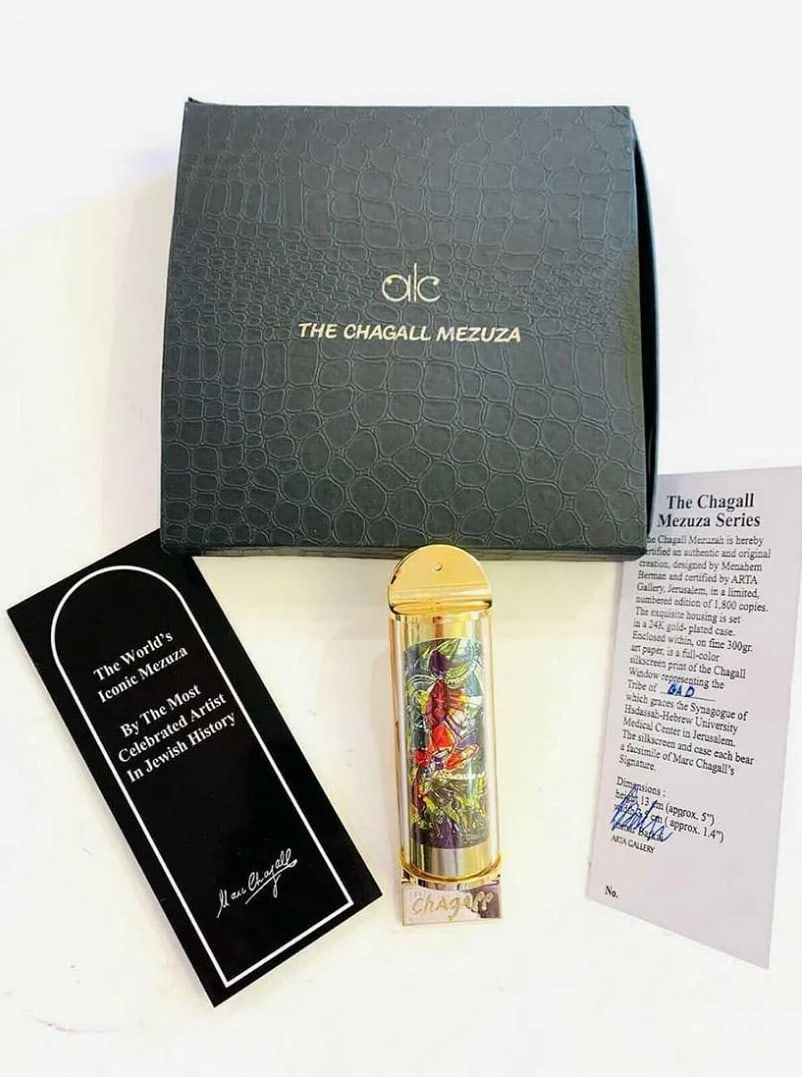 Marc Chagall, 'Gad' Silk Screen in 24K Gold Plated Limited Edition Mezuzah: Artist: Marc Chagall Medium: Mezuzah - Exquisite glass housing is set in a 24K gold plated bronze with full color Silk Screen Title: "GAD" Size: 5" x 1.5" Weight: 7 oz. Limited Edition: Edition of 300