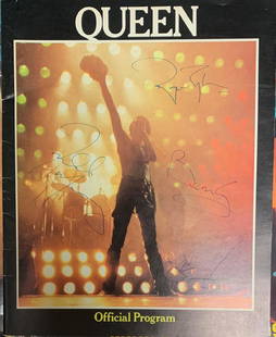 Queen Autographed Program: Vintage tour book signed by Freddie Roger John and Brian. All pages intact!