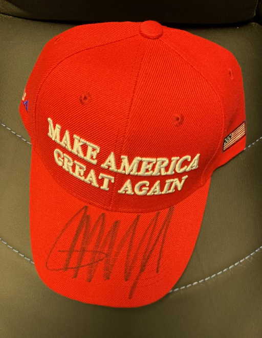 Billings tells helenair republicans cappy holds Donald Trump Autographed Hat