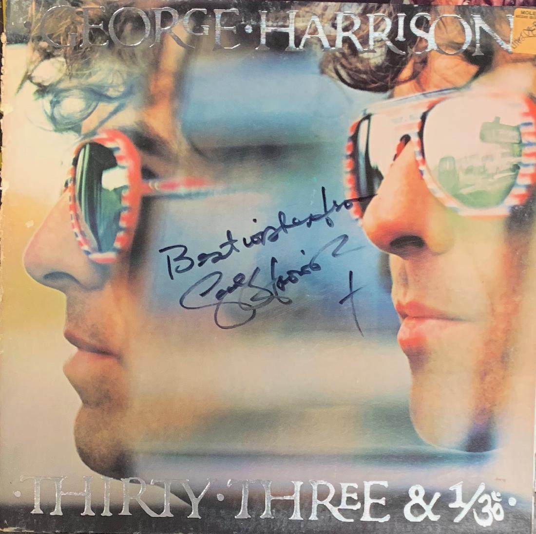 George Harrison Autographed Album: The Beatles George Harrison signed by 33 1/3 solo album.
