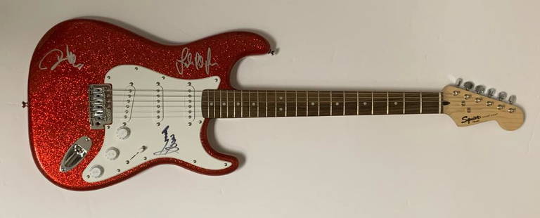 Led Zeppelin Autographed Guitar: Les Paul signed by Jimmy Page John Paul Jones and Robert Plant.