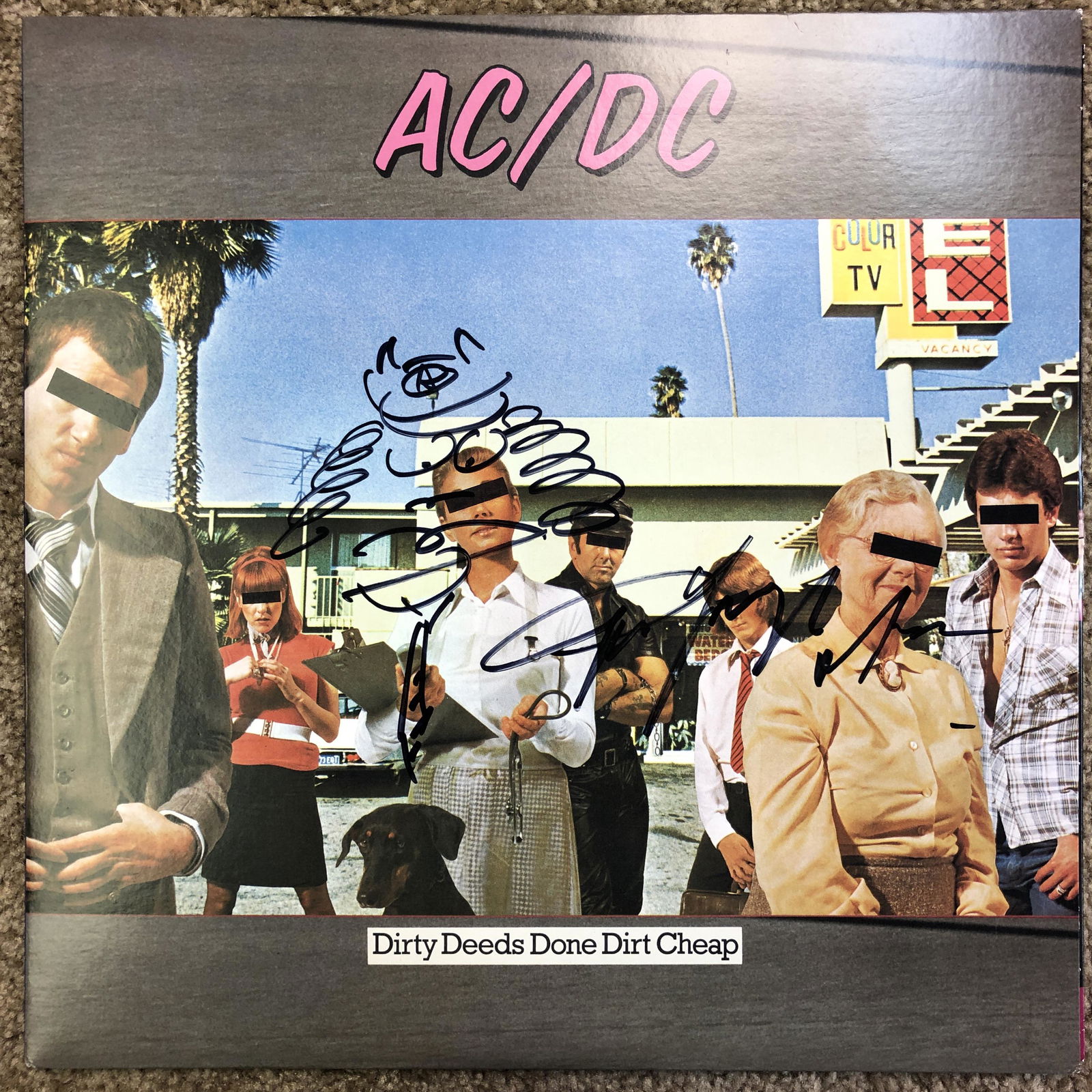 Angus Young Autographed Dirty Deeds Album Cover (1 of 1)