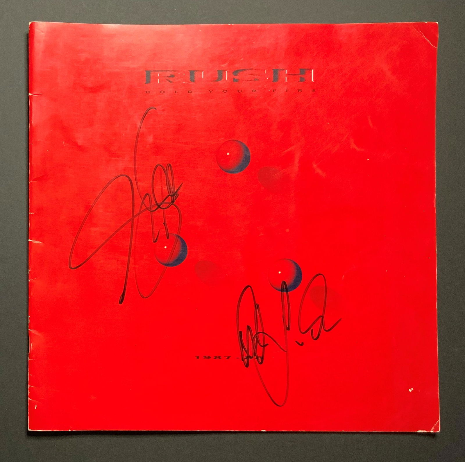 Geddy Lee and Lifeson Autographed Tour Book (1 of 1)