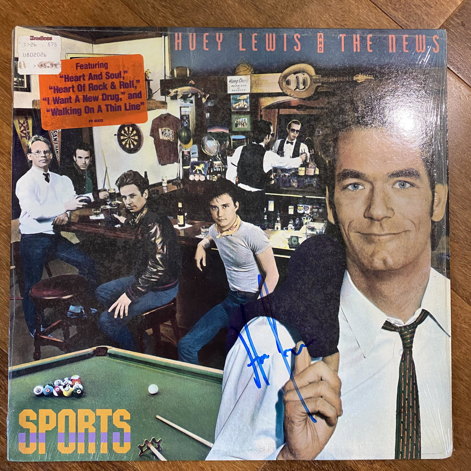 Huey Lewis Autographed Album Cover: Displays are assembled AFTER payment is received, picture is a mock up of finished product. Displays are not framed, and can be framed for a cost. Framed items will state they are framed in the name o