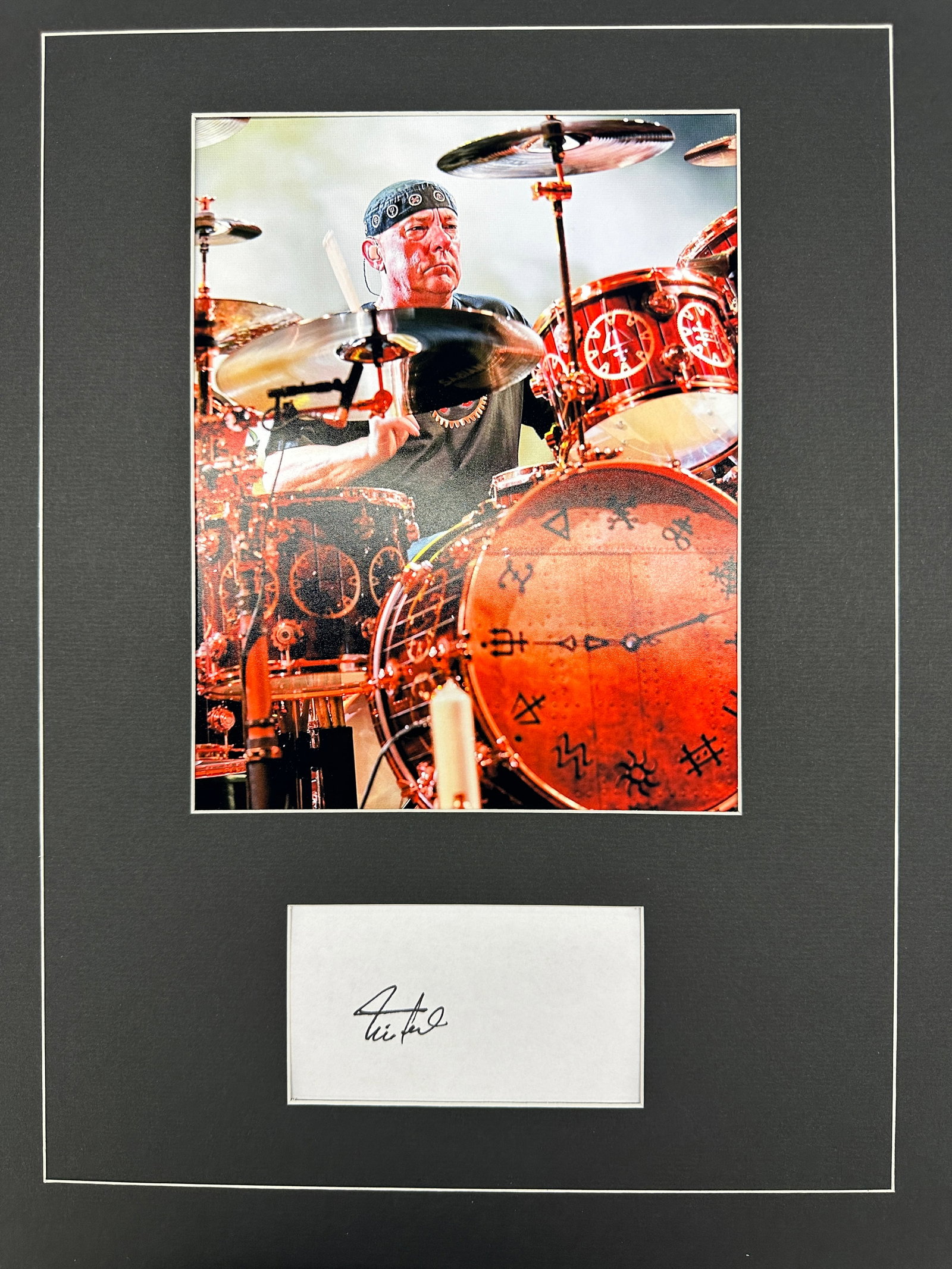 Neil Peart Autograph Display: Displays are not framed, and can be framed for a cost. Framed items will state they are framed in the name of the item. All signed items come with a COA. Ask any and all questions BEFORE bidding. Sign