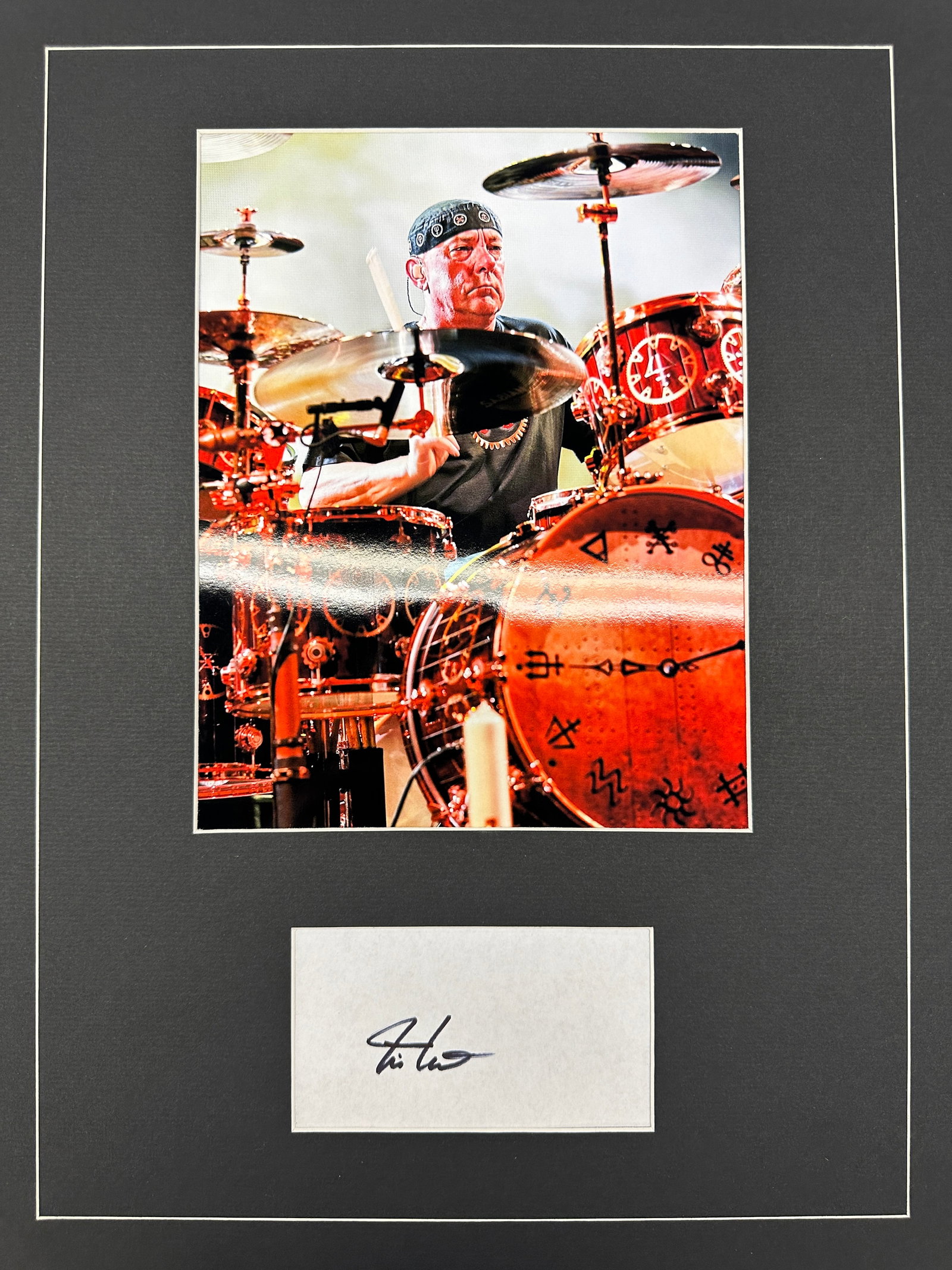 Neil Peart Autographed DISPLAY: Displays are not framed, and can be framed for a cost. Framed items will state they are framed in the name of the item. All signed items come with a COA. Ask any and all questions BEFORE bidding. Sign