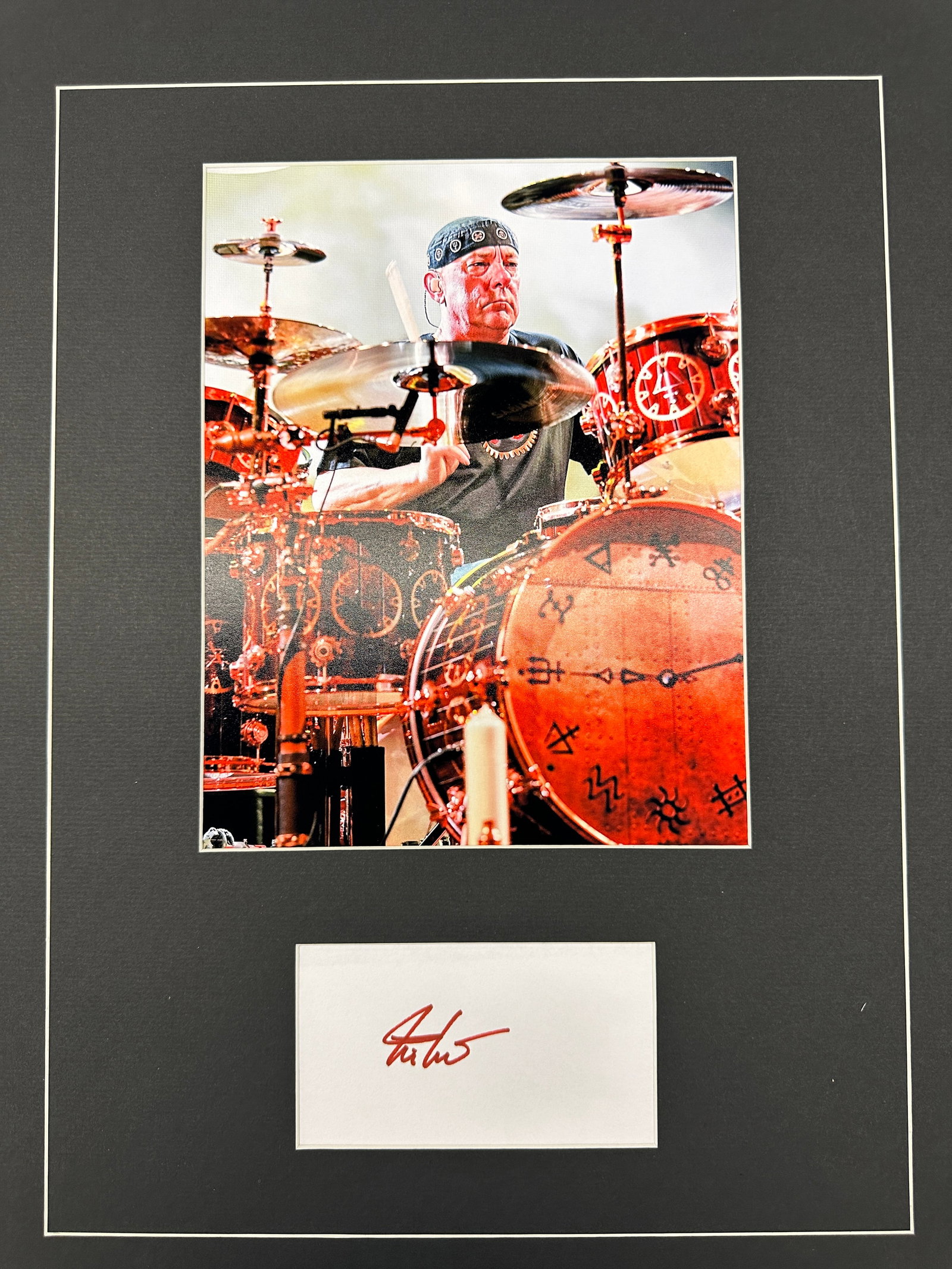 Neil Peart Autograph Display: Displays are not framed, and can be framed for a cost. Framed items will state they are framed in the name of the item. All signed items come with a COA. Ask any and all questions BEFORE bidding. Sign