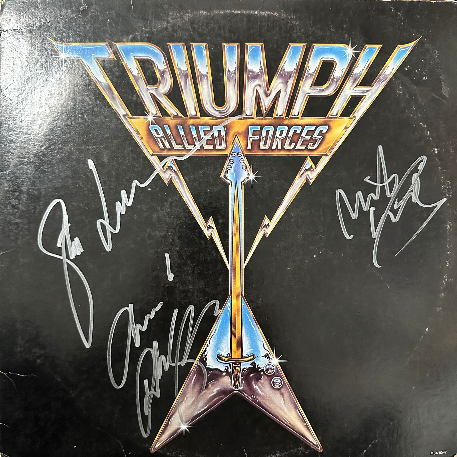 Triumph Autographed Album: Displays are not framed, and can be framed for a cost. Framed items will state they are framed in the name of the item. All signed items come with a COA. All items now come with a 3rd Party COA from P