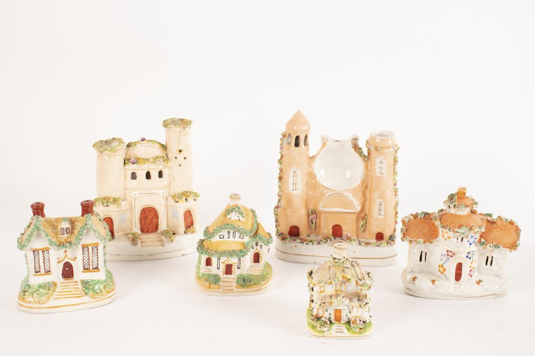 A Staffordshire pottery clock stand modelled as a (1 of 1)