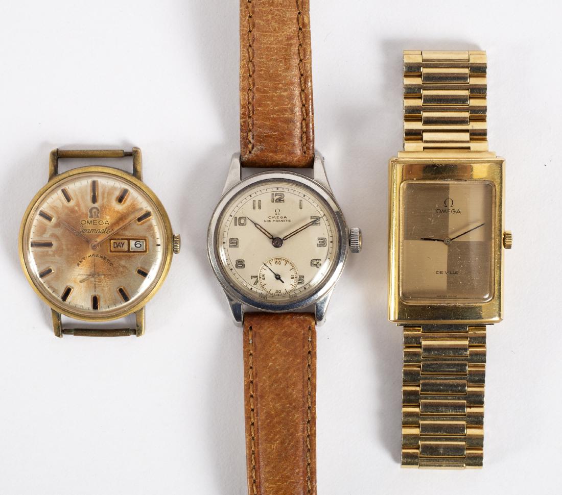 Omega, A replica Seamaster wristwatch with case (no: Omega, A replica Seamaster wristwatch with case (no strap) with date aperture and antimagnetic dial (no strap), an Omega non-magnetic wristwatch with stainless steel case, pigskin strap and a rectangu