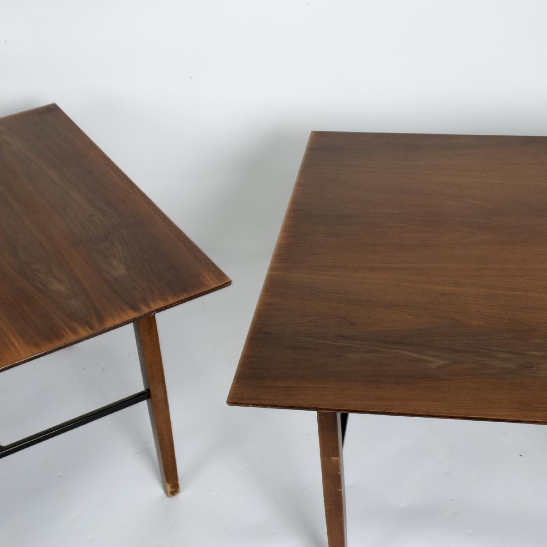 Two Knoll walnut tables, each with rectangular top on: Two Knoll walnut tables, each with rectangular top on square tapering legs united by H stretchers