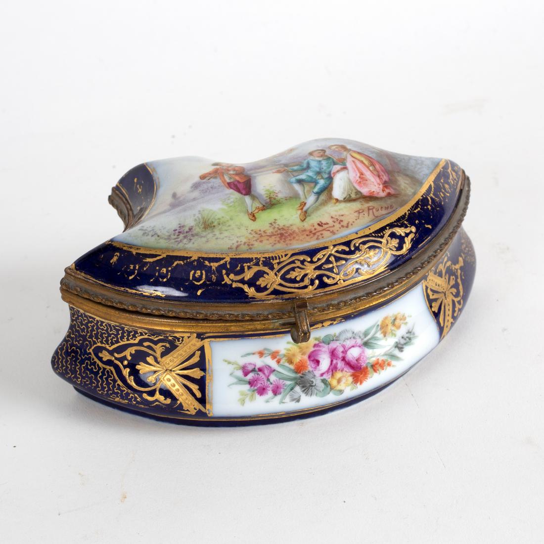 A French porcelain box, the cover decorated figures, (1 of 2)