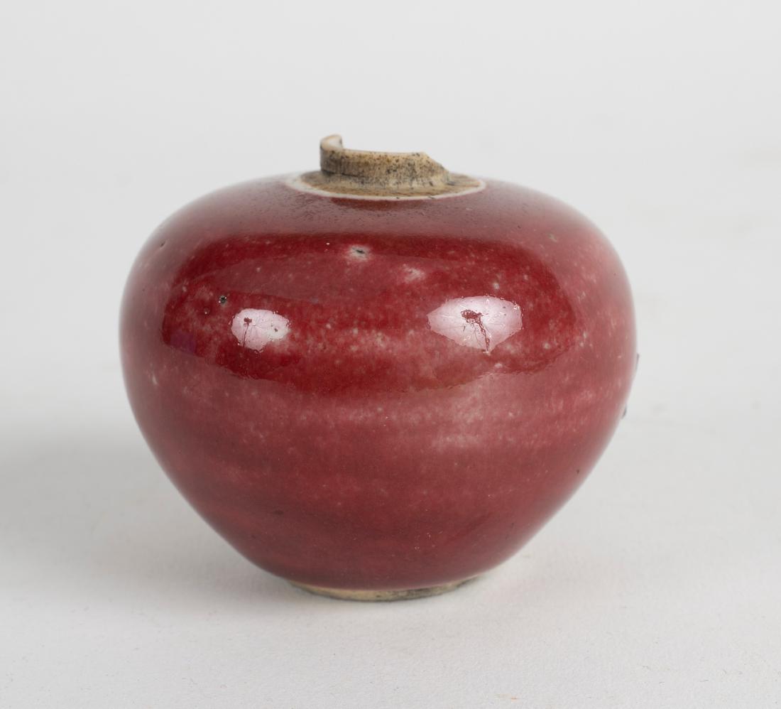 A Chinese sang de boeuf globular vase, 6cm high: A Chinese sang de boeuf globular vase, 6cm high