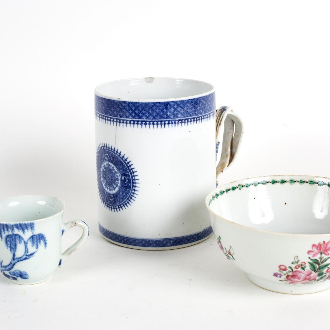 A Chinese export mug with entwined handle, 13.5cm high, (1 of 2)